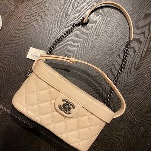 Cream colored Chanel Bag